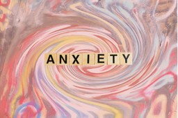 Anxiety disorders. A swirling psychedelic bvackground with scrabble letters in the centre spelling out the word 'ANXIETY'.