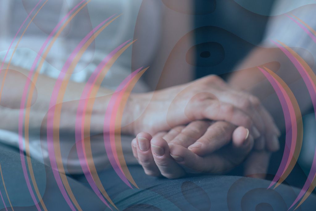 Trip Sitter. A close up of the hands of two seated people holding hands. There is a feint blue flowy pattern overlayed on the image, and what looks like soundwaves emanating from the hands.