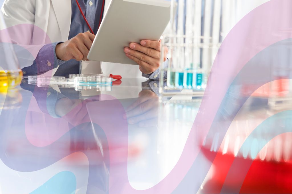 Psychedelic Clinical Trials. Image is set in a lab with experimental tubes and a person behind a laptop, holding a clipboard. There are swirls of psychedelic colours over the image.