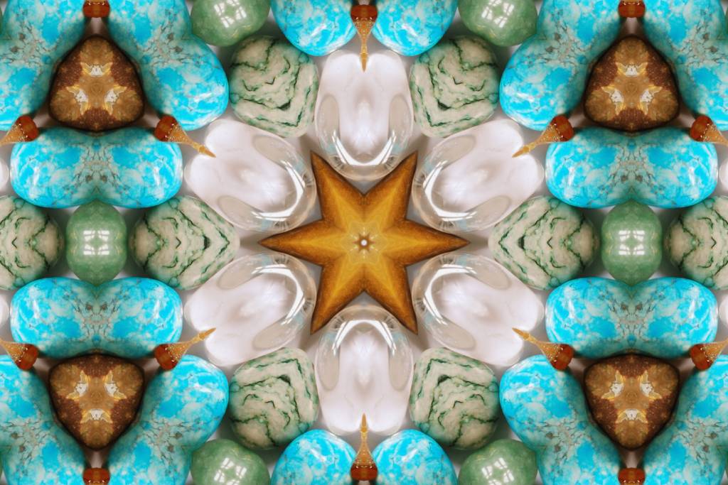Altered states of consciousness. A dreamlike technicolor kaleidoscope of turquoise, earthy greens, browns, and some other earthy colours. A digitally designed modern boho style crystal gemstone inspired mandala kaleidoscopic pattern.