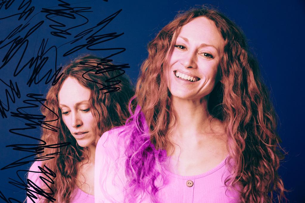 High-Functioning Anxiety. Multiple exposure portrait of a woman standing in front of a blue colored background. She is looking at the camera in one exposure while smiling, and looking down in the other, upset. There are jagged black squiggles surrounding the upset version of her. Representing inner turmoil.