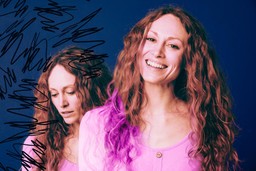 High-Functioning Anxiety. Multiple exposure portrait of a woman standing in front of a blue colored background. She is looking at the camera in one exposure while smiling, and looking down in the other, upset. There are jagged black squiggles surrounding the upset version of her. Representing inner turmoil.