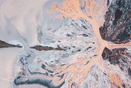 Overhead landscape photo of a pipe adding pink waste to a glacial landscape, by Ivan Bandura
