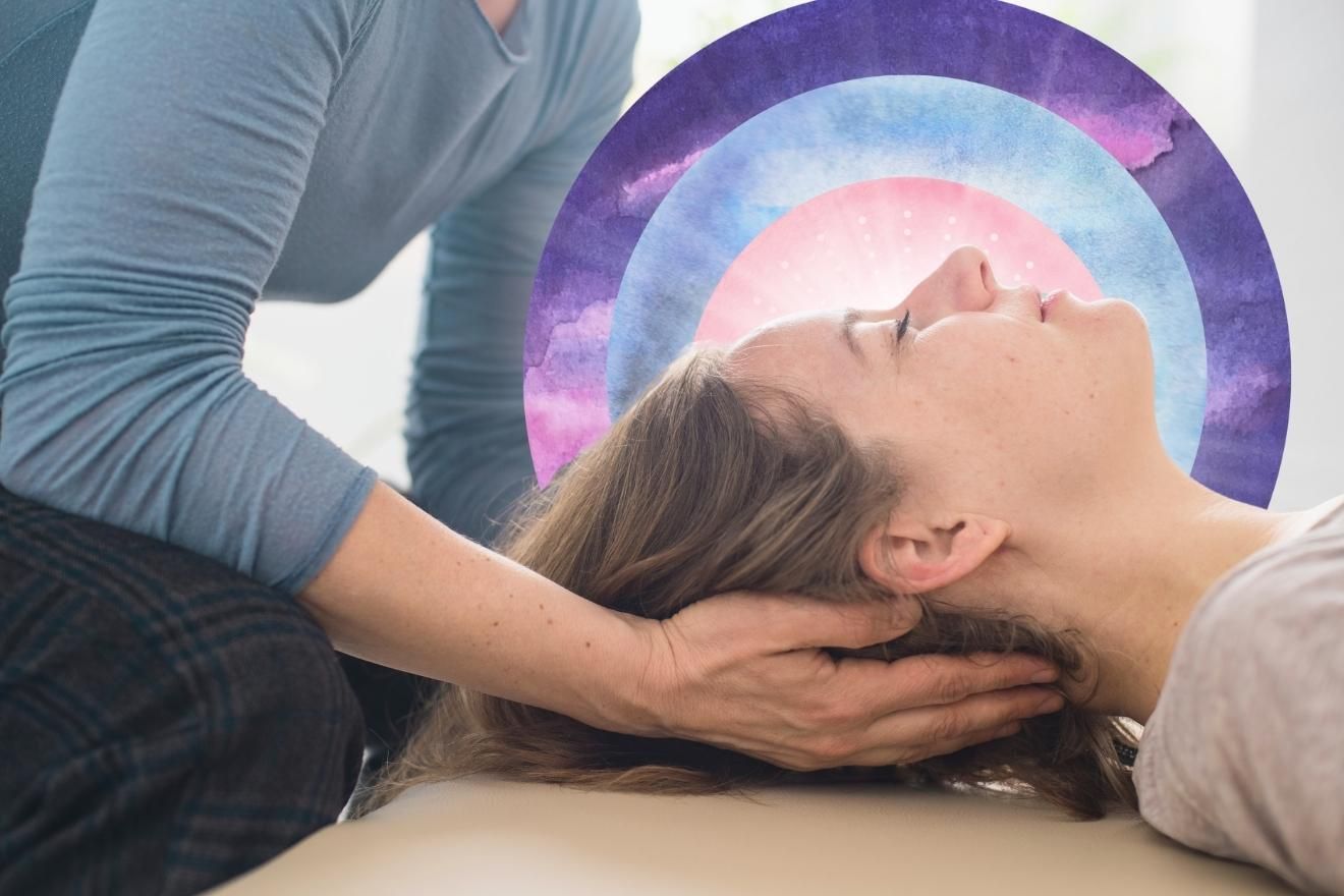 Somatic therapy in psychedelic therapy. The image depicts a serene scene of a woman lying on her back, receiving a gentle craniosacral therapy or healing touch. A person, wearing a long-sleeved blue-gray shirt, cradles the woman’s head with both hands, providing a sense of care and support. Behind the woman's head is a circular, dreamy, watercolor-like background composed of concentric rings in shades of purple, blue, and pink, adding a spiritual and calming atmosphere. The overall color palette is soft and soothing, with the focus on the gentle touch and the ethereal, abstract backdrop.