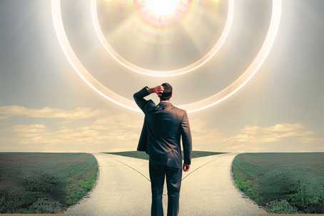 Psychedelic experience. A businessman in a suit standing at a fork in the road, he is looking up at glowing rings in the sky, contemplating his future, surreal, dreamlike, hopeful.