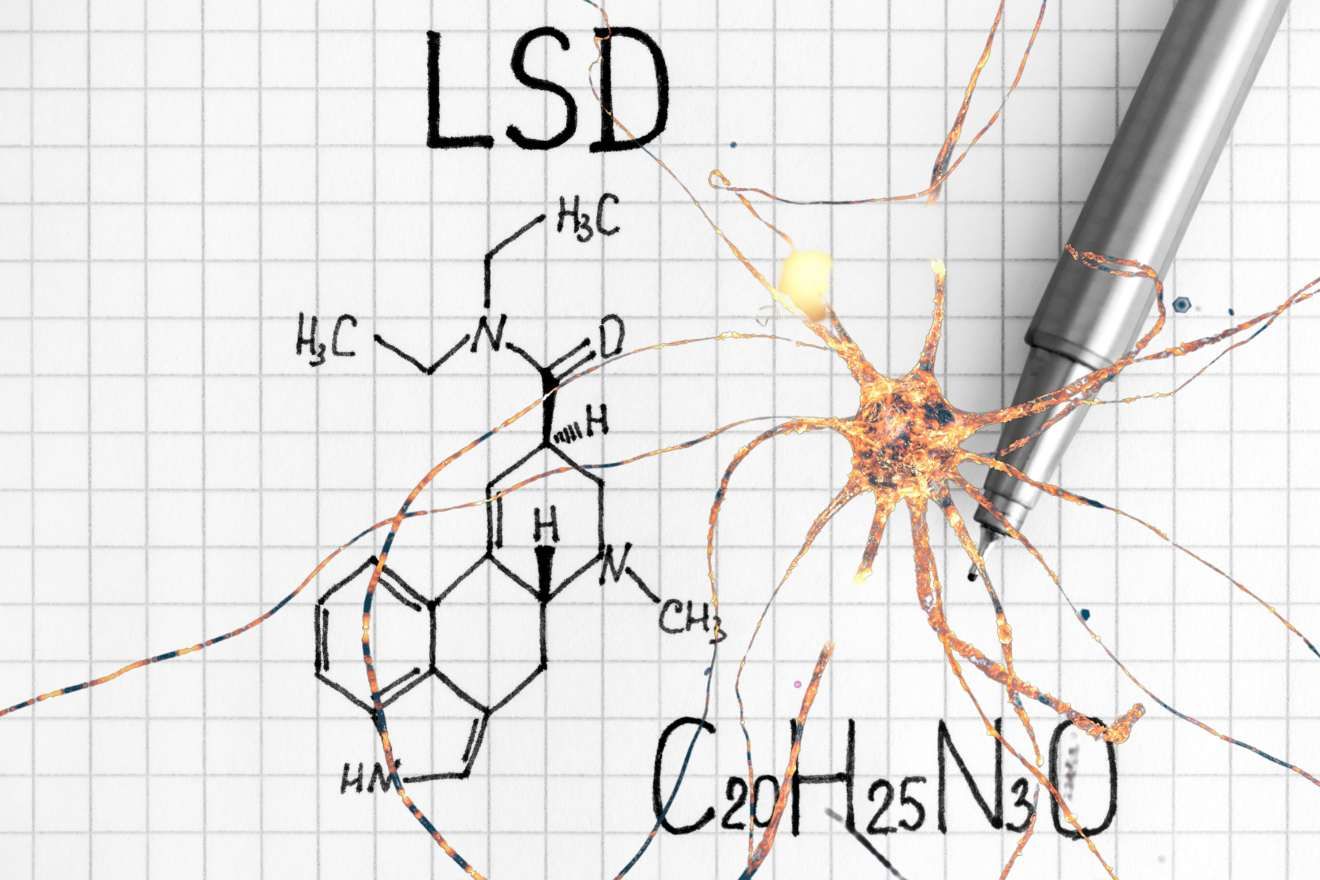 LSD and Learning. Molecular structure of LSD drawn on grid paper, with a silver pen laying on the right, with a golden firing neuron overlaid on the image.