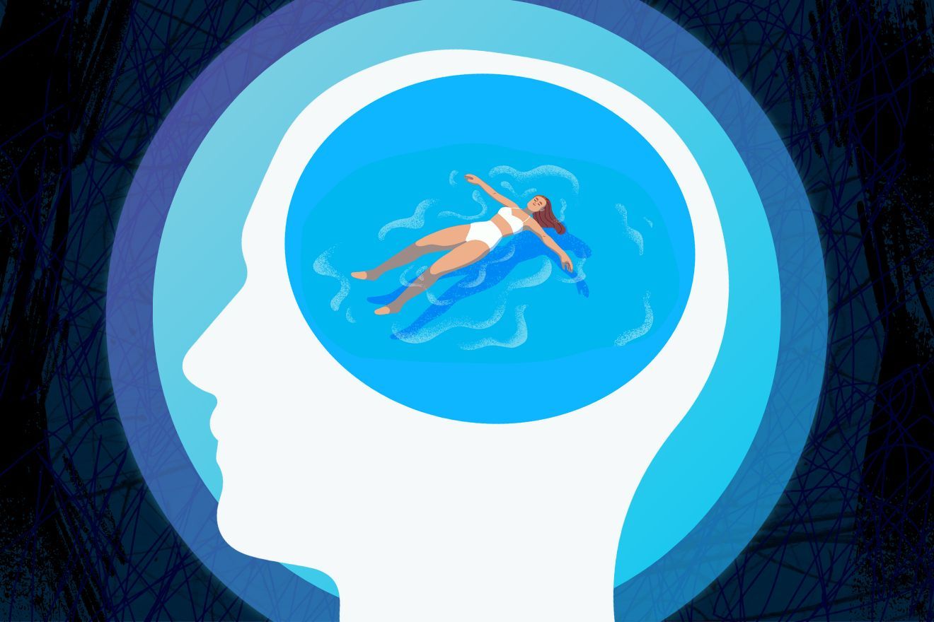 Anxiety levels. A dark blue background with scribbles creating an anxious energy. There is a white graphic of a human head in profile. In the area of the brain, there is graphic of a medium blue circle of water with a person lying on their back in the water.